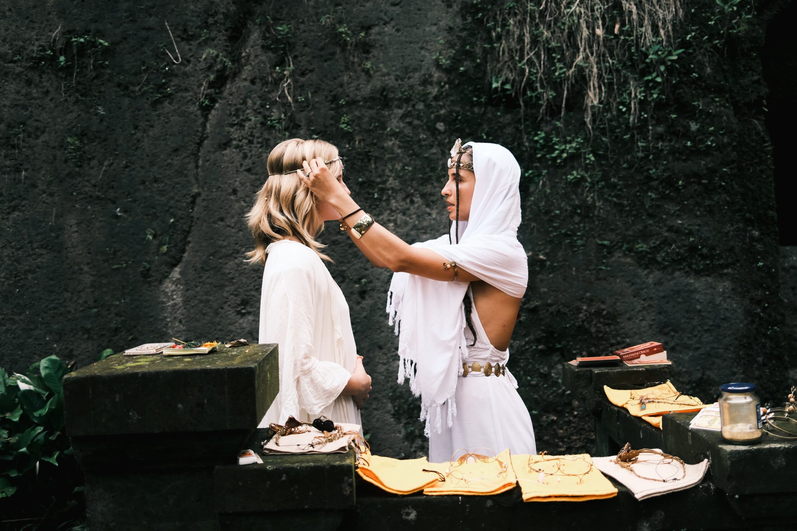 Adina Nicola crowning a woman at Bali temple altar