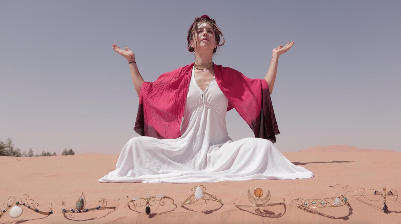 Adina Nicola with handcrafted crowns — Morocco desert
